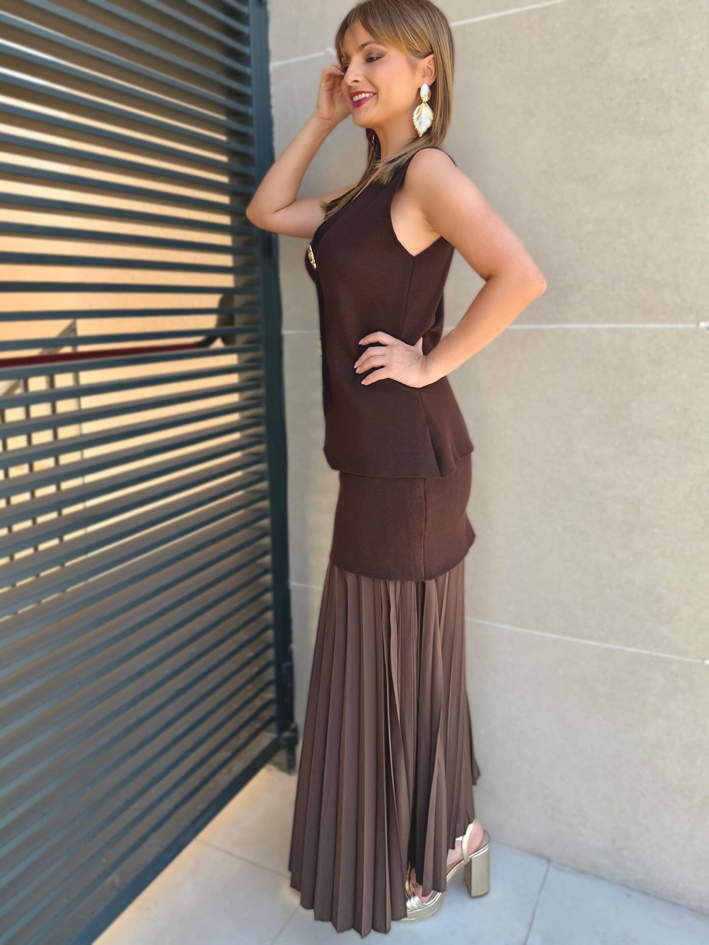 Conjunto de chaleco y falda